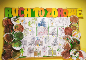 Tablica grupy Pszczółki z wykonanymi przez dzieci pracami plastycznymi.